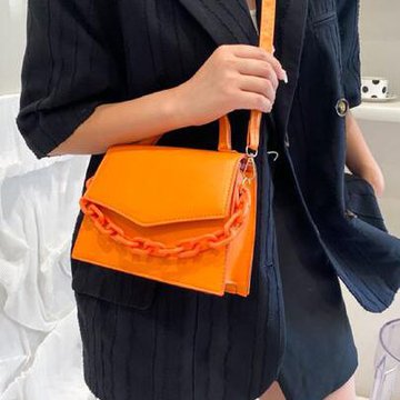 Оранжевая сумка-сэтчел с крупной цепочкой