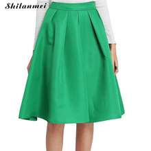 Пышная зеленая юбка до колена