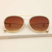 Солнцезащитные очки с коричневыми линзами 