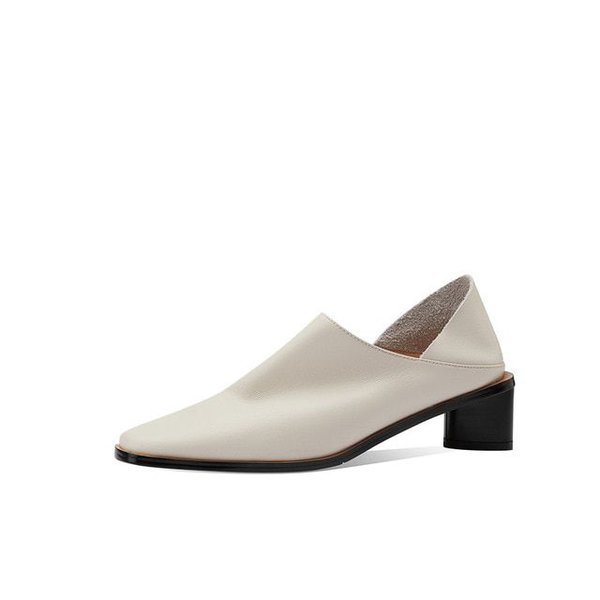 Белые туфли на небольшом каблуке 